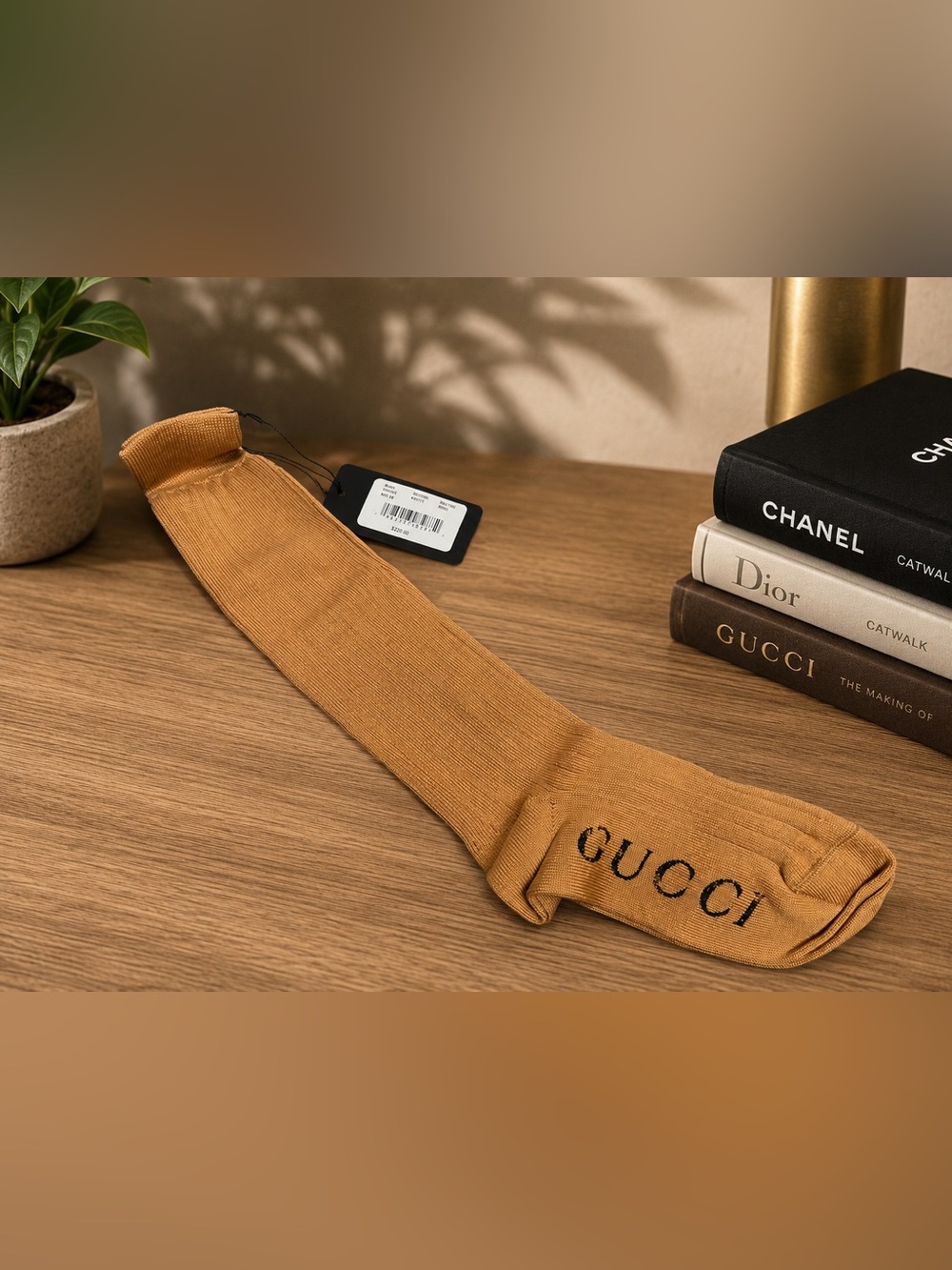 Gucci 1 pair of long sock size M. Retails $220.